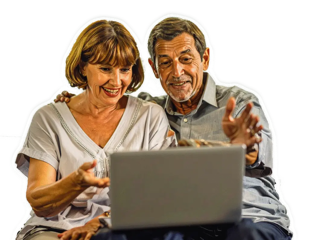 Middle age couple looking at laptop